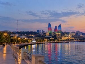 Modern illuminated Flame Towers overlooking the Caspian Sea in Baku Azerbaijan, a 3-hour flight from Dubai