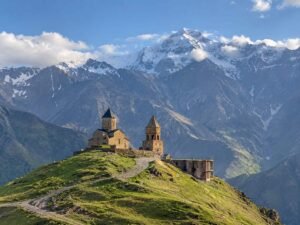 Gergeti Trinity Church against Mount Kazbegi in Georgia, a popular visa-free weekend destination for UAE residents