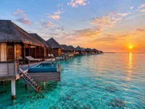 Luxury overwater bungalows in the Maldives surrounded by turquoise ocean, a 4-hour quick getaway for UAE residents