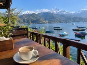 Mobile camera shot of Phewa Lake and Annapurna mountains in Pokhara Nepal taken by a traveler from Dubai